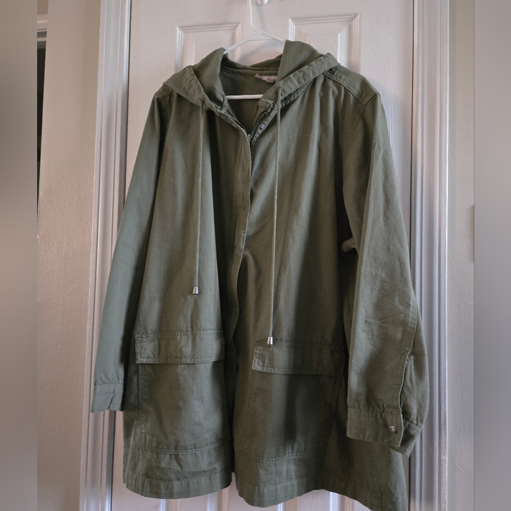 Woman Within Khaki Green Jacket